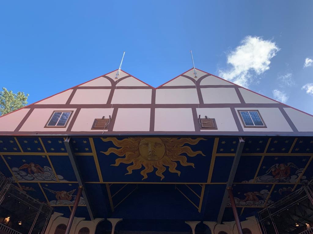 The ceiling of an Elizabethan stage with a brilliant sun